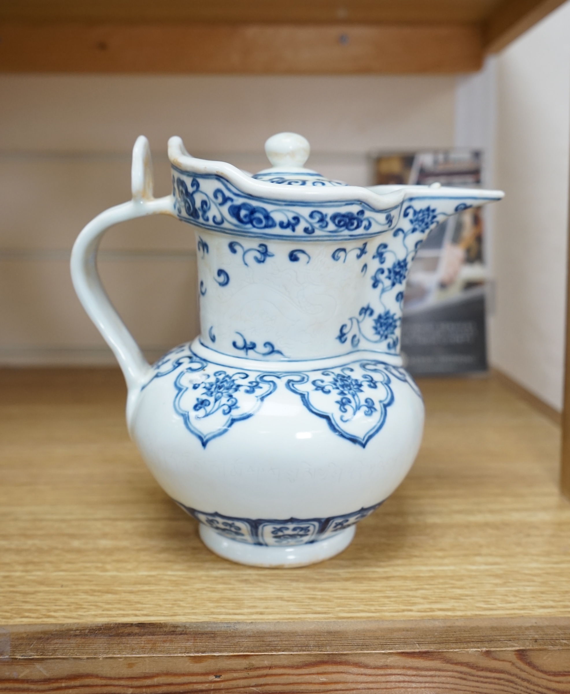 A Chinese blue and white water pot and cover, 19cm. Condition - good